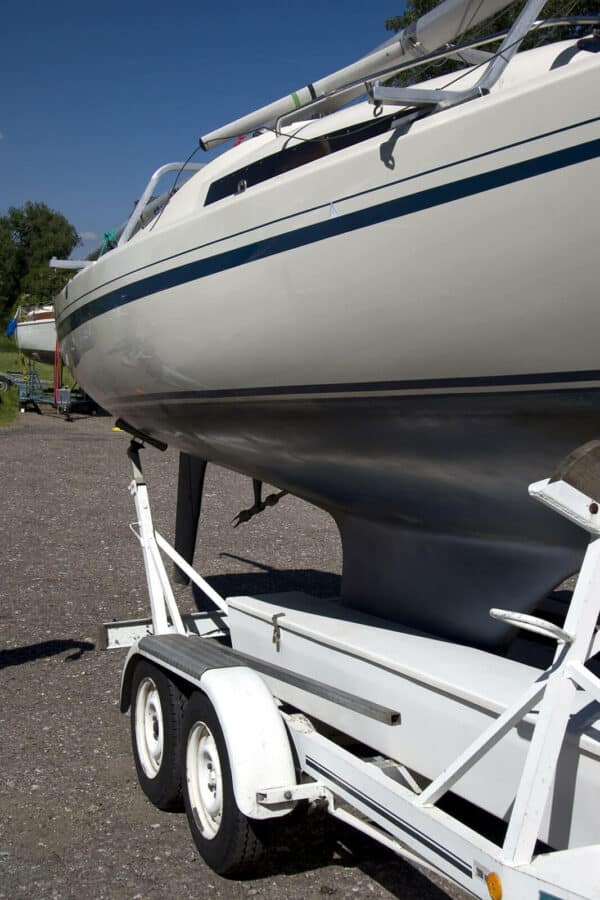 up close view of a white boat on a trailer