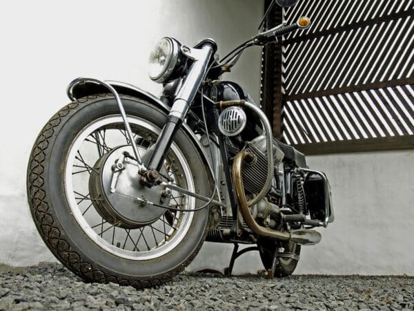 black motorcycle stored upright on it's kickstand